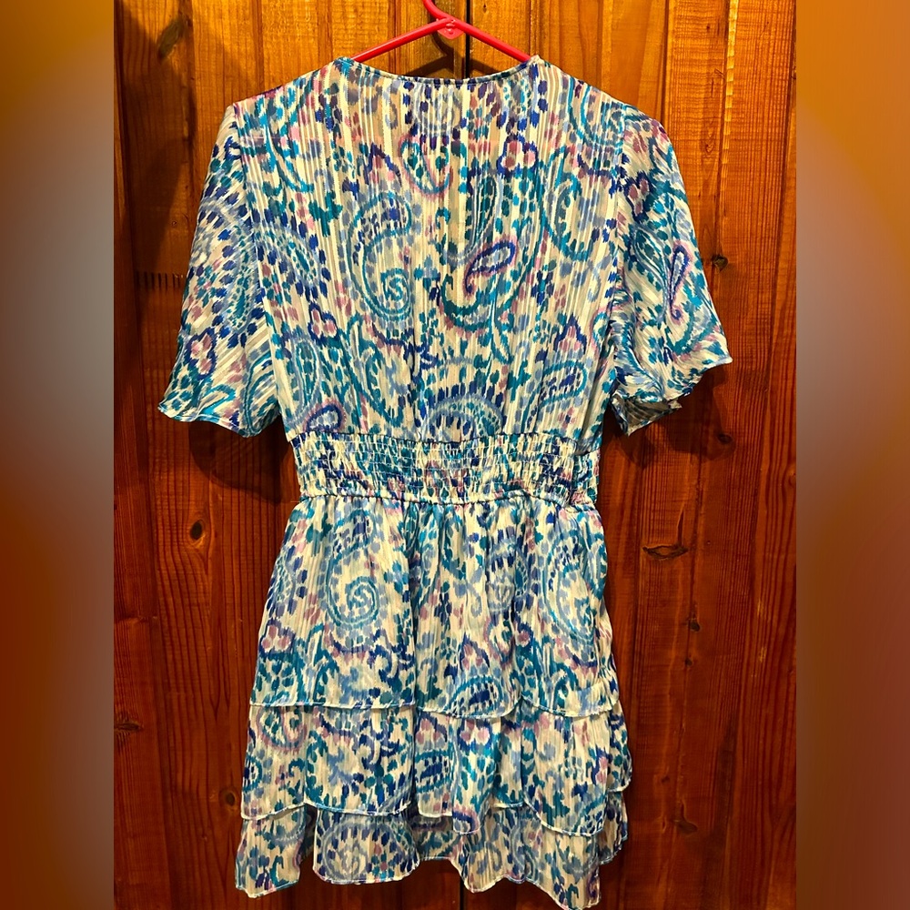 Women’s/juniors V neck dress. It has a gold shimmer through it.